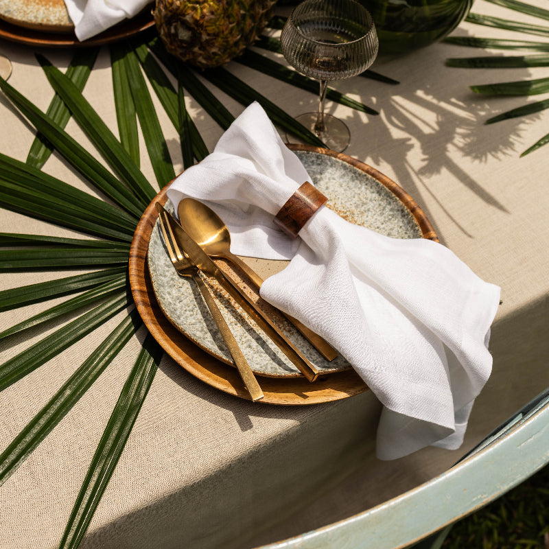 beige sand linen tablecloth and white linen napkins