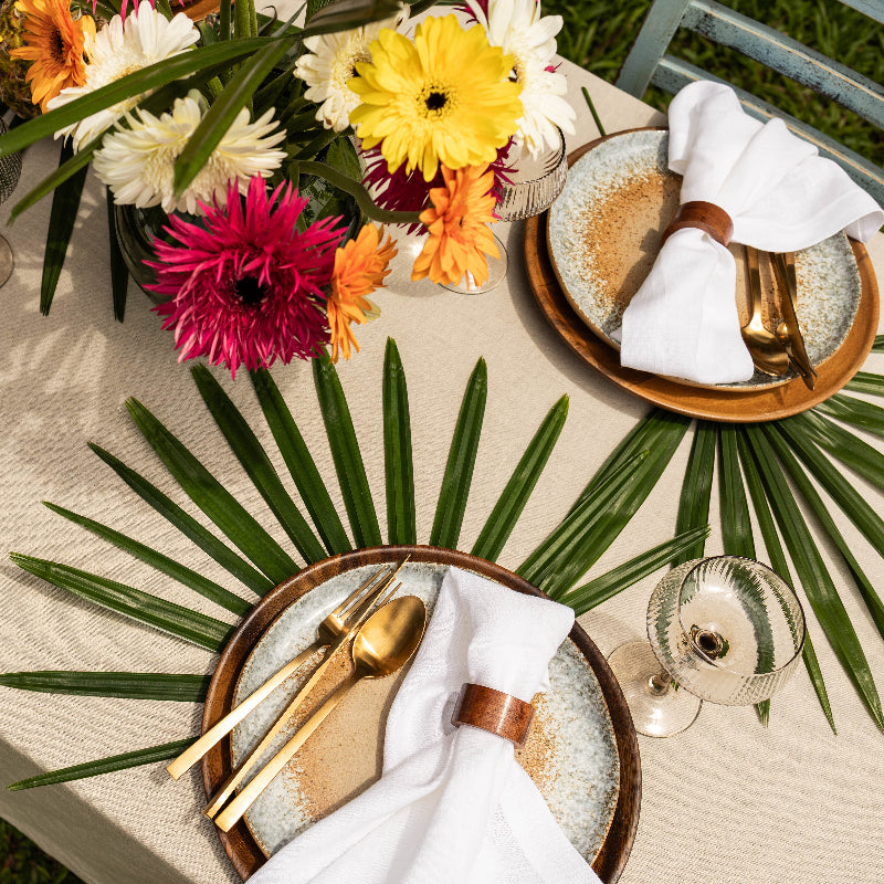 beige sand linen tablecloth and white linen napkins