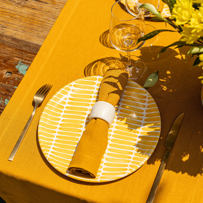Yellow table runner linen with yellow mustard napkins summer table with table runners.